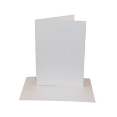 White greeting card on a matching envelope against a white background