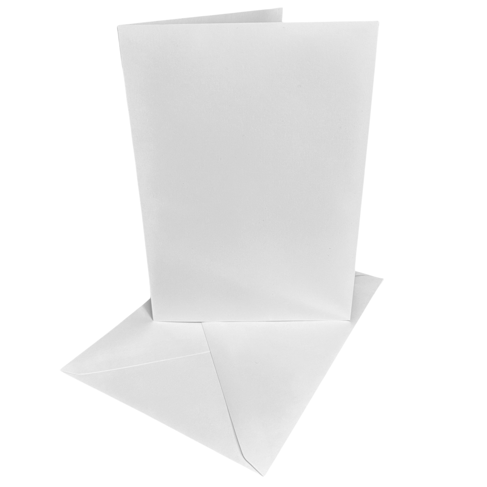 White card blanks with matching envelopes arranged neatly, ready for handmade greeting cards and invitations.